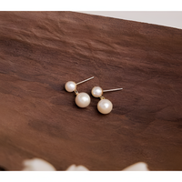 Mesmerizing Elegance Pearly Dangler Earrings