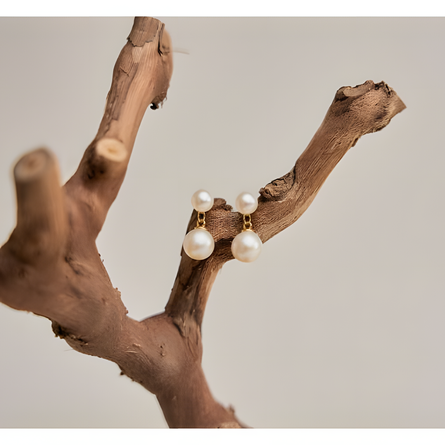 Mesmerizing Elegance Pearly Dangler Earrings