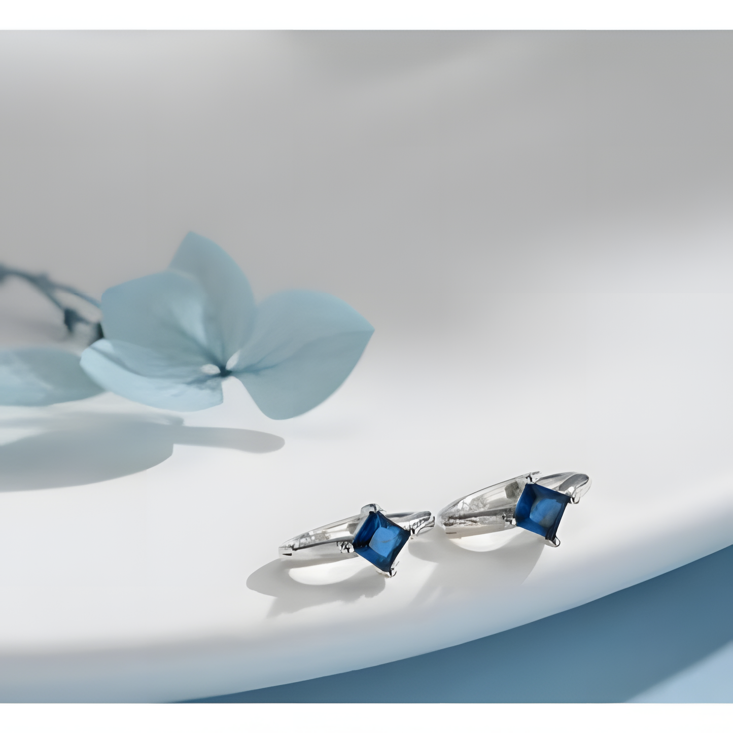 Ocean's Embrace Blue Zircon Hoops