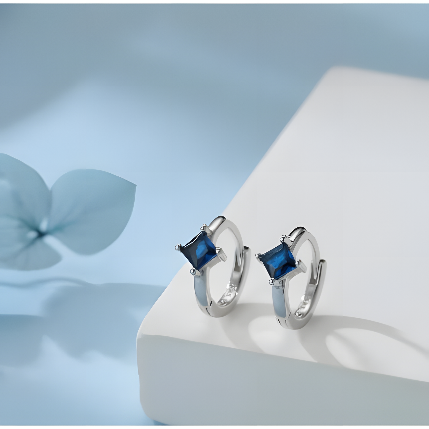 Ocean's Embrace Blue Zircon Hoops